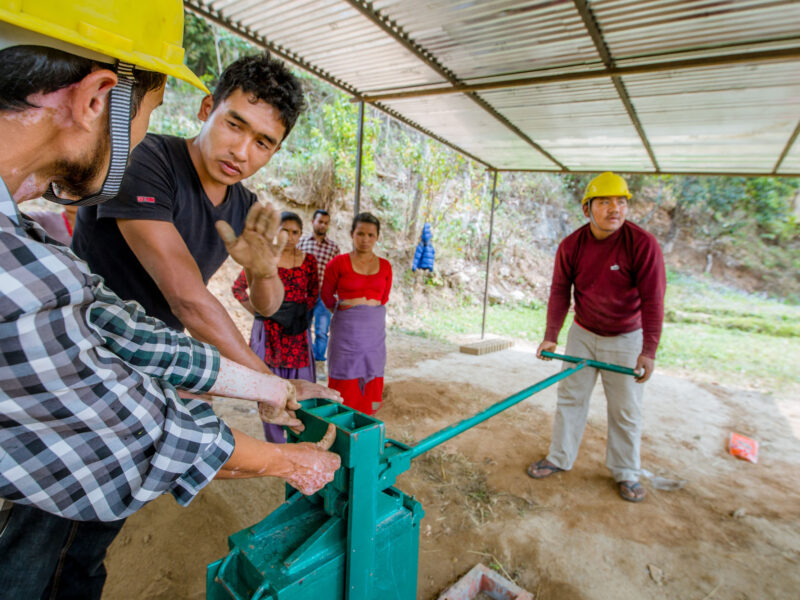 Training on use of Interlocking brick machines in house construction