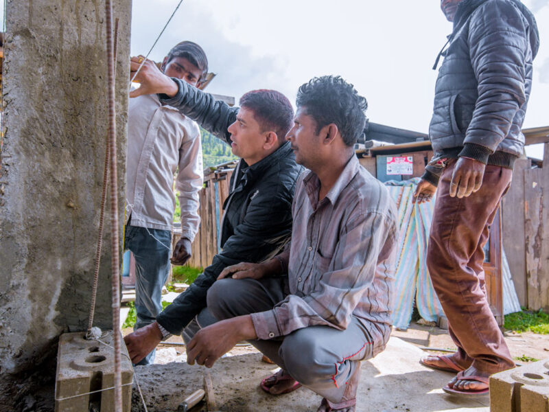 Training on use of compressed stabilized earth brick